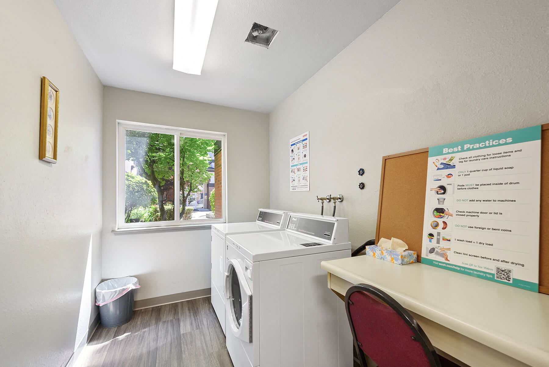 Laundry Room at Auburn Court Apartments in Auburn WA